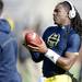 Michigan senior quarterback Denard Robinson warms up prior to his last game at Michigan Stadium during the final game of the season on Saturday morning. Melanie Maxwell I AnnArbor.com